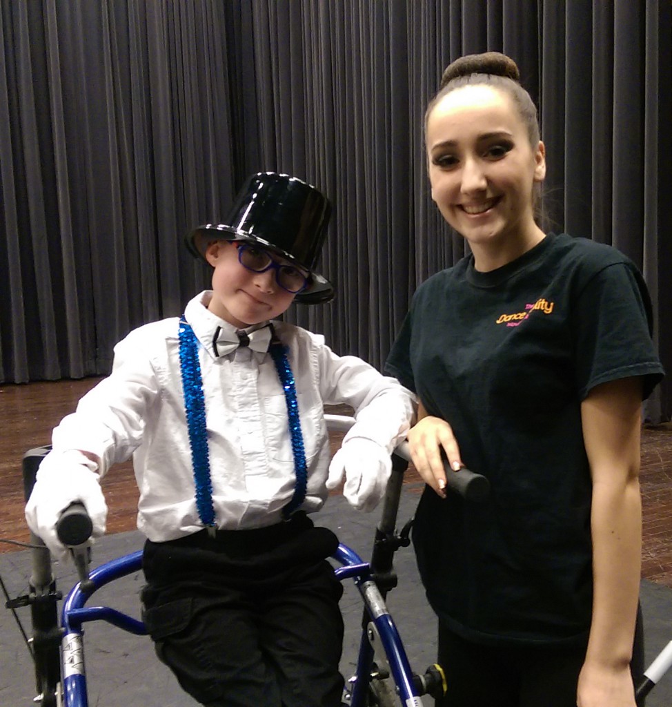 Samantha with one of her dance buddies who brought her a large bouquet of roses and a hand-made card!